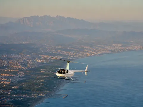 Helicopter approaching the Montserrat massif