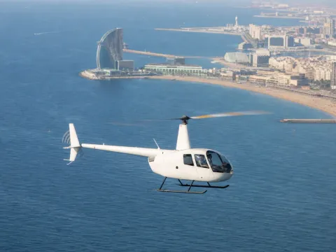 Helicopter over Barceloneta beach on the Barcelona Coast Tour