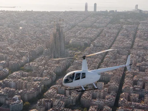 Helicopter passing Sagrada Família on the Barcelona Sky Tour