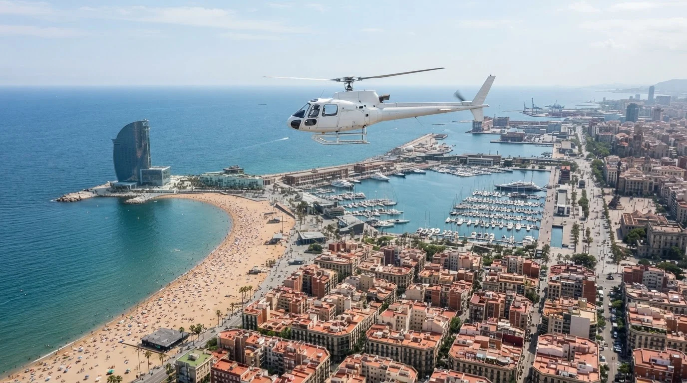 A small white helicopter flying over Barceloneta beach and the Port Vell marina on a clear Barcelona morning